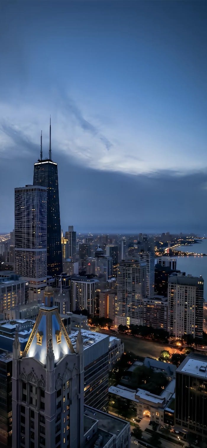 Hình nền thành phố lấp lánh đèn đường